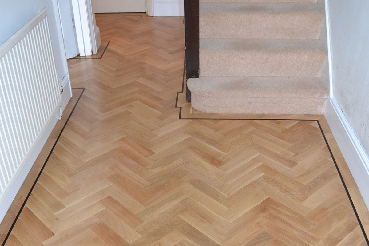 Herringbone Oak Flooring with Border BSN Flooring Services